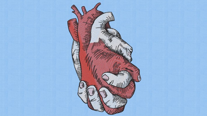 Holding Heart Embroidery Designs